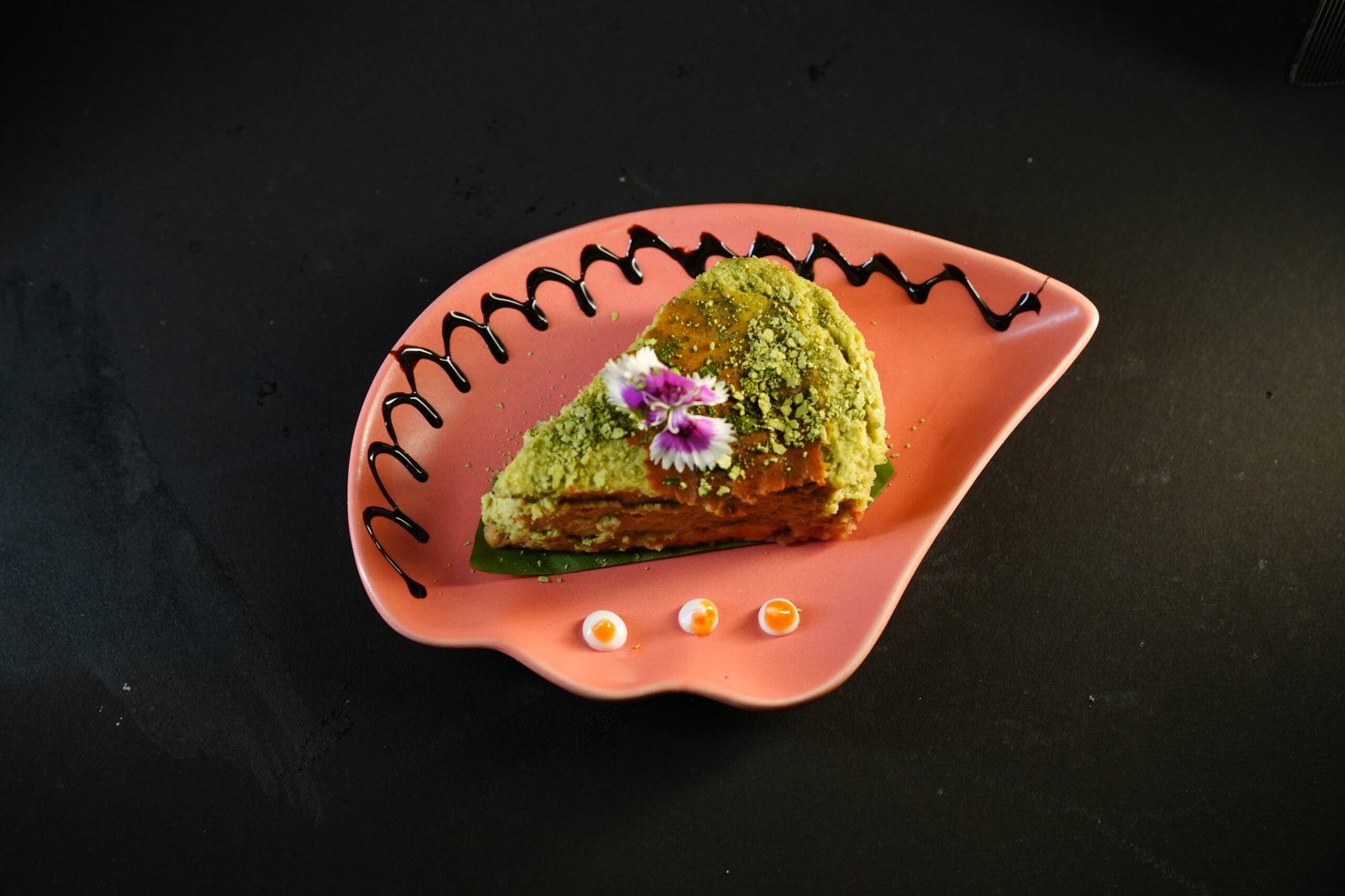 Japanese matcha cheesecake slice served at Kampot in Bengaluru